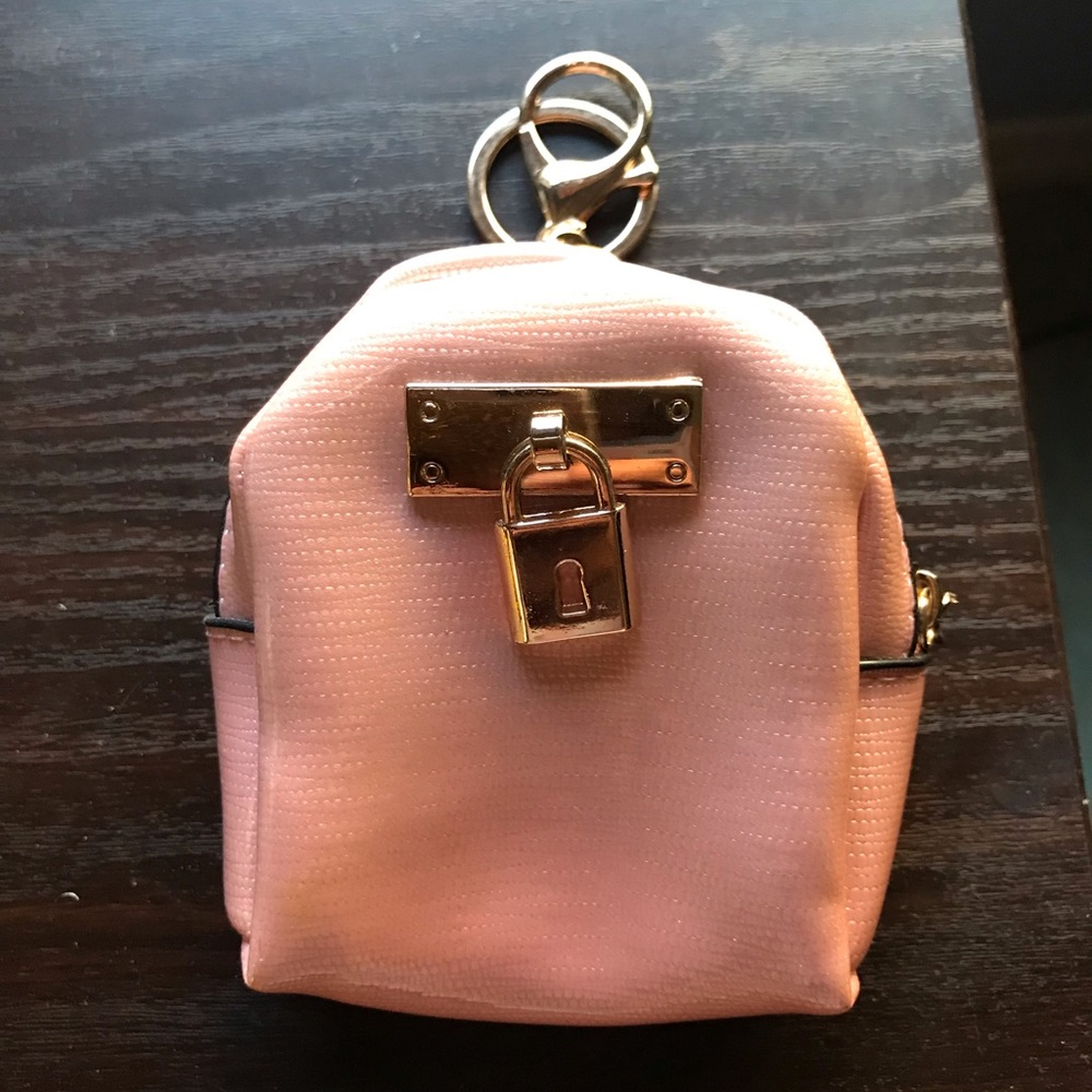 Mini charm backpack rose color with details in gold  with keychain